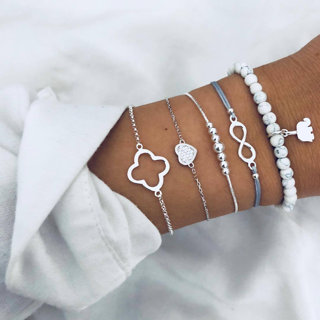 Dangling Charm Bracelets | Gold bracelet for girl, Gold bracelet for women, Fashion  bracelets